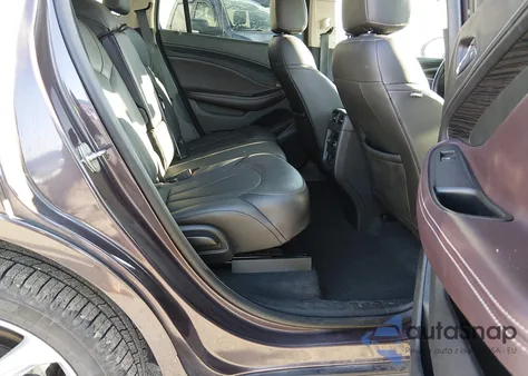 2017 Buick Envision Premium I z USA, uszkodzony, nr VIN LRBFXESX0HD145572